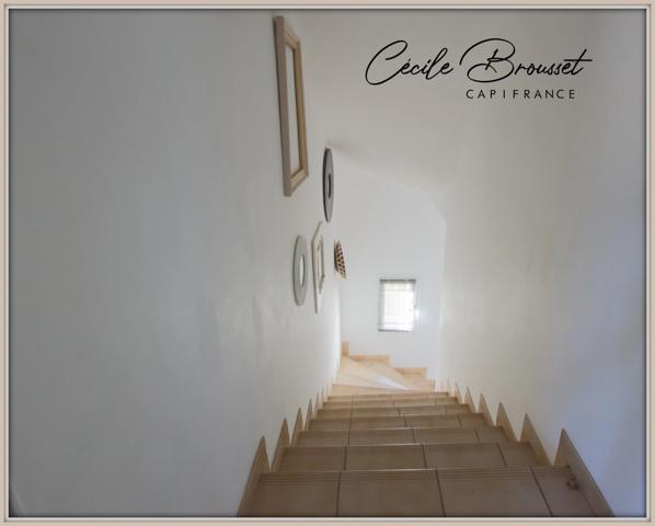 Villa 4 faces à vendre sur 1425 m2 de terrain avec garage et studio indépendant à REYNES (66)