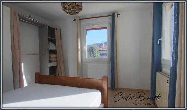 Villa 4 faces à vendre sur 1425 m2 de terrain avec garage et studio indépendant à REYNES (66)