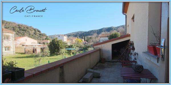 Villa 4 faces à vendre sur 1425 m2 de terrain avec garage et studio indépendant à REYNES (66)