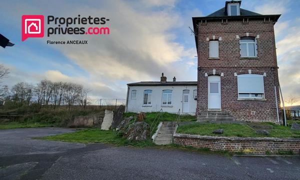 ENSEMBLE IMMOBILIER AVEC 2 BATIMENTS PROFESSIONNELS ET UNE MAISON