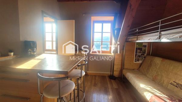 studio chaleureux au centre du village.