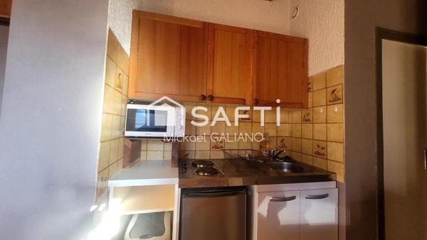 studio chaleureux au centre du village.