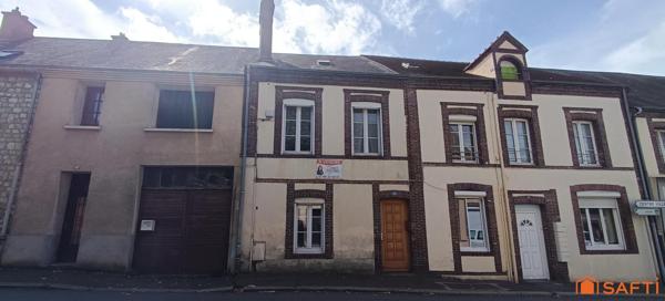 Maison de ville avec jardin et potentiel