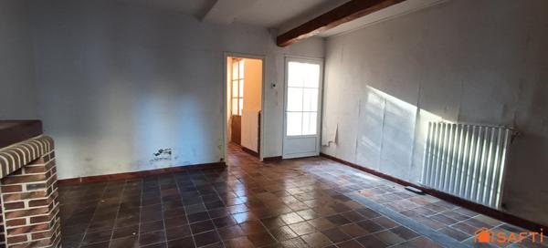 Maison de ville avec jardin et potentiel