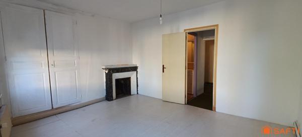 Maison de ville avec jardin et potentiel