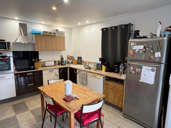 ENSEMBLE IMMOBILIER AU BEAU POTENTIEL