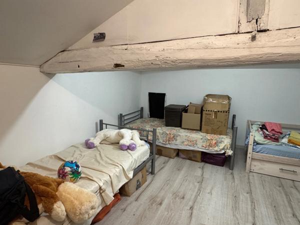 ENSEMBLE IMMOBILIER AU BEAU POTENTIEL