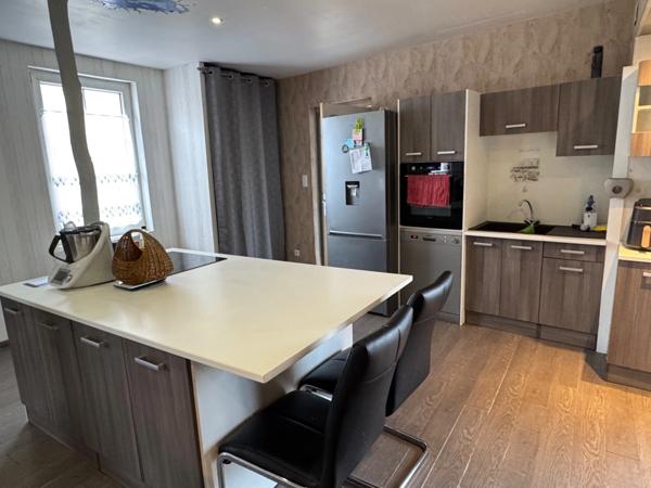 ENSEMBLE IMMOBILIER AU BEAU POTENTIEL