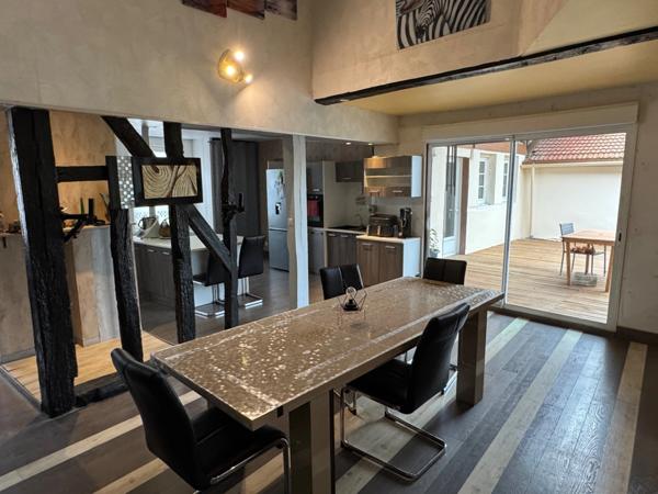 ENSEMBLE IMMOBILIER AU BEAU POTENTIEL