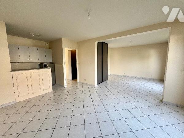 APPARTEMENT EN REZ DE CHAUSSE AVEC GARAGE ET STATIONNEMENT