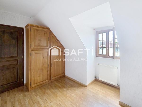 Maison familiale non-mitoyenne avec jardin, au calme