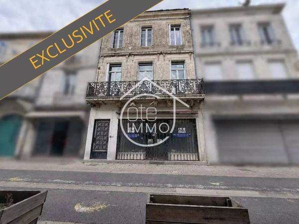 Sainte-Foy-la-Grande : Immeuble de Rapport à Fort Potentiel – Commerce, Appartements, Grenier et Dépendances