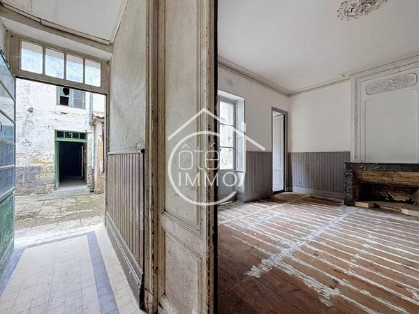 Sainte-Foy-la-Grande : Immeuble de Rapport à Fort Potentiel – Commerce, Appartements, Grenier et Dépendances