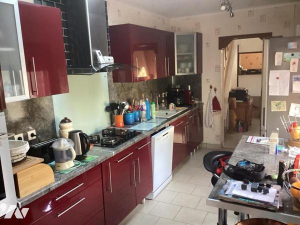 Maison de 85 M2 HAB double garage et jardin