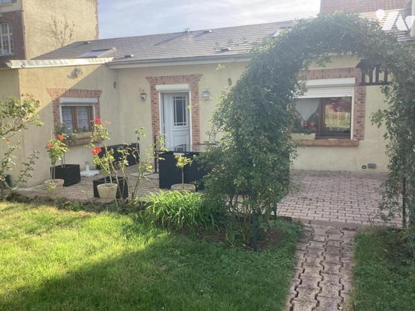 Maison de 85 M2 HAB double garage et jardin