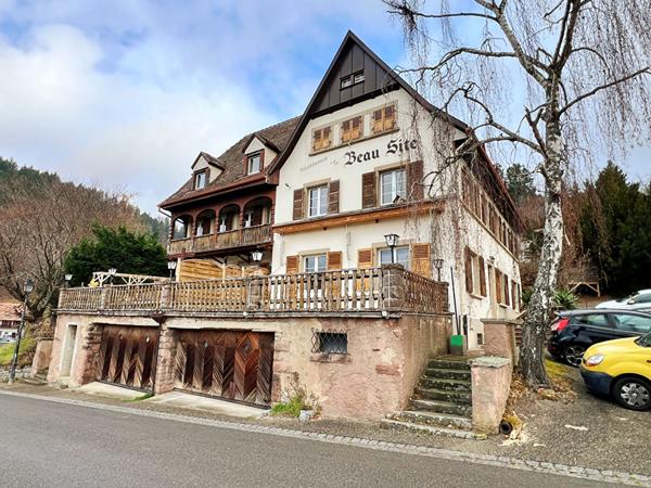 Immeuble - 6 logements - parking - garages - caves