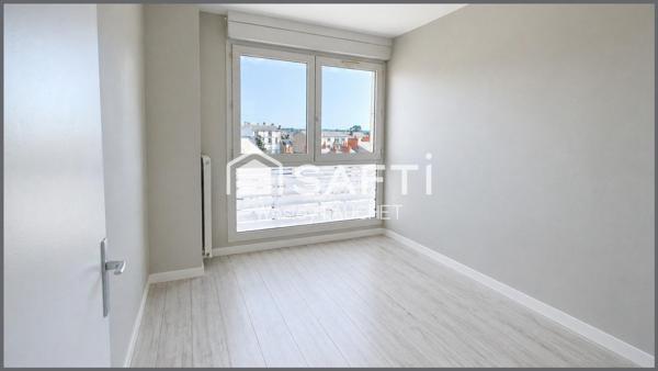 Bien rare en hypercentre avec balcon et vue sur l’église Saint André