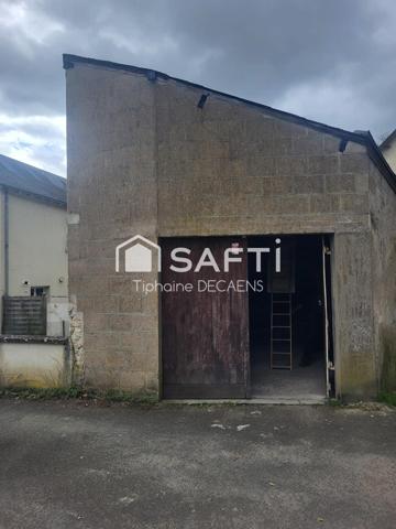garage avec mezzanine, pouvant devenir un logement