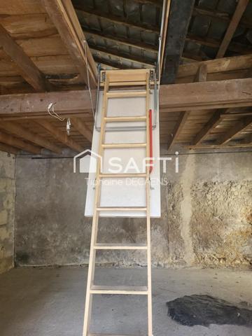 garage avec mezzanine, pouvant devenir un logement