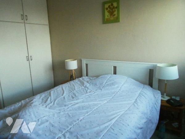 Quartier PONTLIEUE, appartement au pied du tramway, proche commerces, avec balcon, 2 chambres.