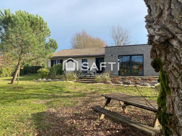 Chaleureuse maison familiale T6 sur terrain clos.