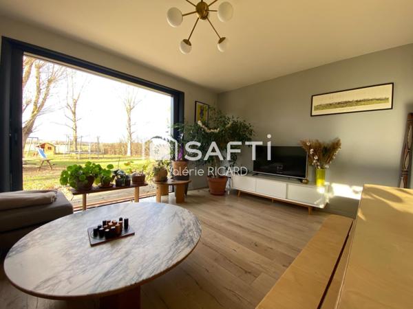 Chaleureuse maison familiale T6 sur terrain clos.