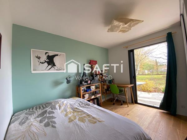 Chaleureuse maison familiale T6 sur terrain clos.