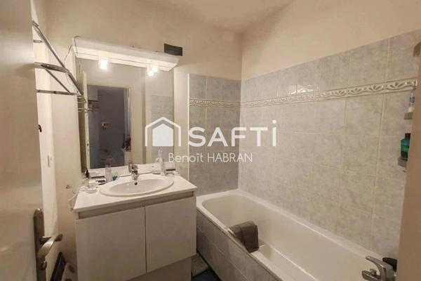 Appartement de 62m2, 3 pièces , 2 chambres,garage.