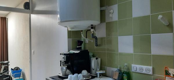 APPARTEMENT PLAIN PIED AVEC ANCIEN LOCAL COMMERCIAL COEUR DE VILLE