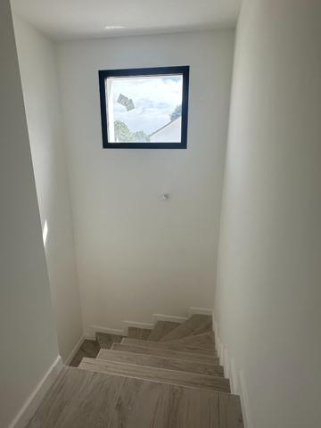 Questembert, maison neuve 118 m², 4 chambres dont 1 au RDC, garage. 1 km des Halles.