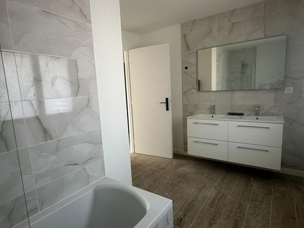 Questembert, maison neuve 118 m², 4 chambres dont 1 au RDC, garage. 1 km des Halles.