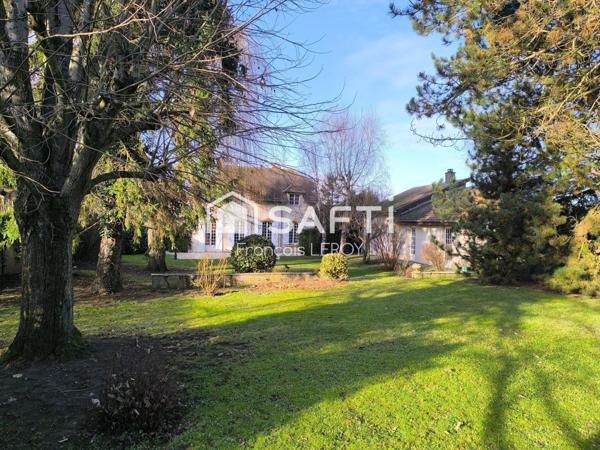 Maison de caractère avec grand parc et dépendance