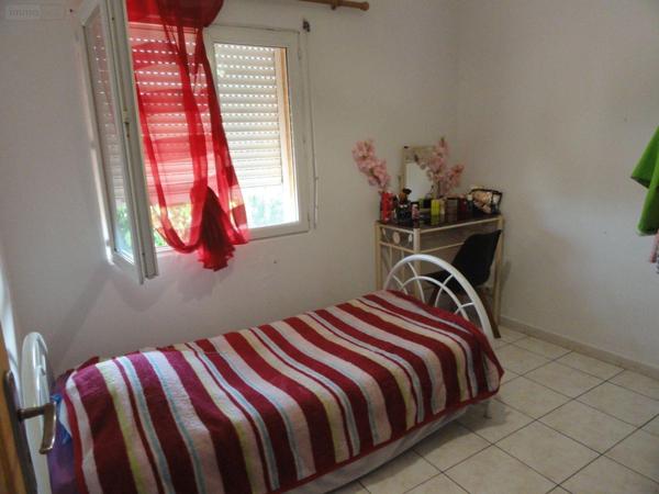 Maison individuelle à vendre à Saint-Gilles dans le Gard (30800), ref : 11411/409