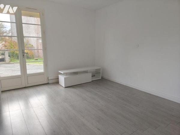 Ensemble immobilier composé de deux logements et garage