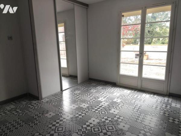 Ensemble immobilier composé de deux logements et garage