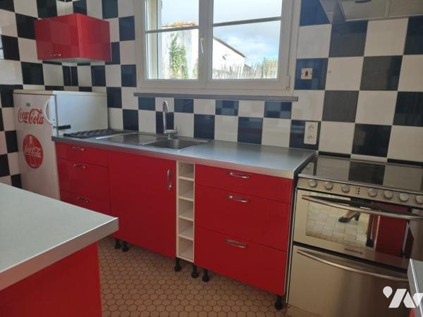 Ensemble immobilier composé de deux logements et garage