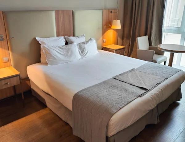 LMNP Roissy CDG – Studio 23 m² + parking – Bail 2032 – 5,7 % rendement