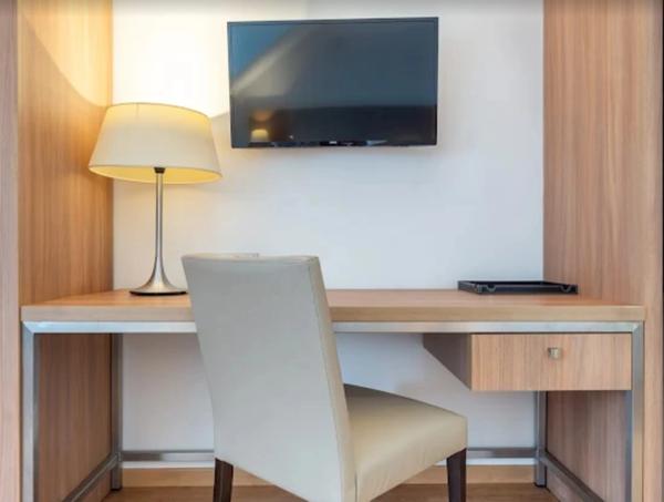 LMNP Roissy CDG – Studio 23 m² + parking – Bail 2032 – 5,7 % rendement