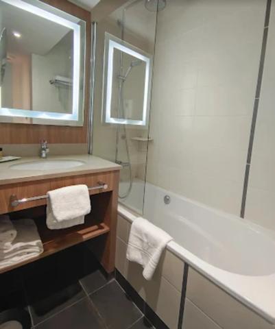 LMNP Roissy CDG – Studio 23 m² + parking – Bail 2032 – 5,7 % rendement