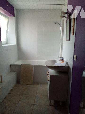 Maison mitoyenne 
entrée individuelle  jardin privatif  et garage