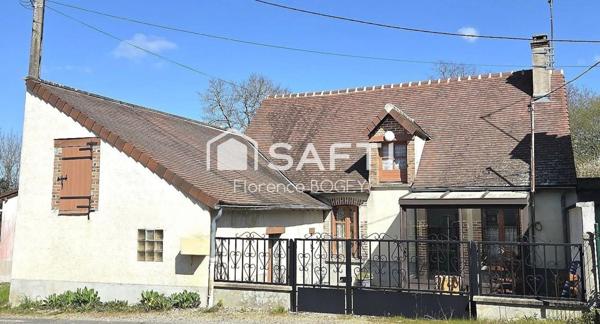 Maison de plain-pied pleine de charme, à réinventer dans un écrin de nature.