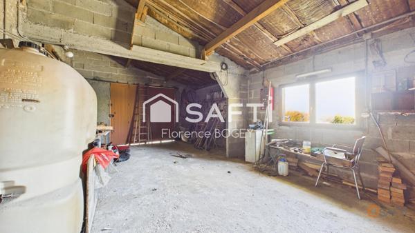 Maison de plain-pied pleine de charme, à réinventer dans un écrin de nature.