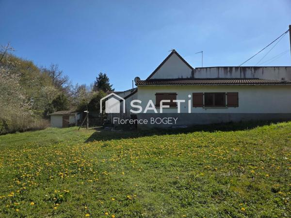 Maison de plain-pied pleine de charme, à réinventer dans un écrin de nature.