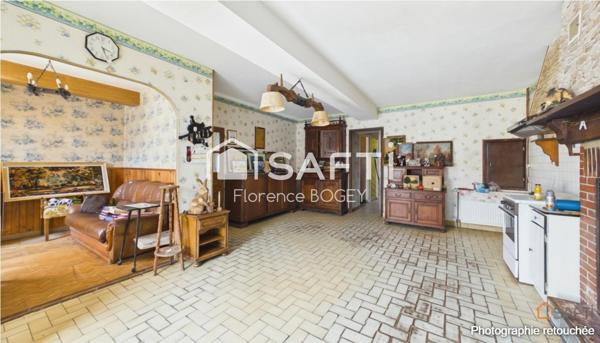 Maison de plain-pied pleine de charme, à réinventer dans un écrin de nature.