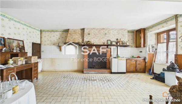 Maison de plain-pied pleine de charme, à réinventer dans un écrin de nature.