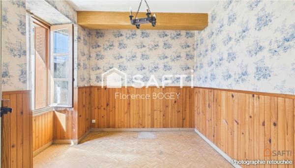 Maison de plain-pied pleine de charme, à réinventer dans un écrin de nature.