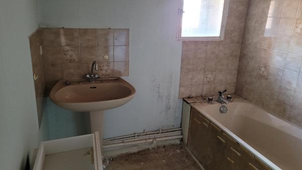 Immeuble avec local commercial