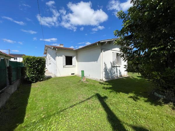 Maison traitionnelle sur parcelle arborée