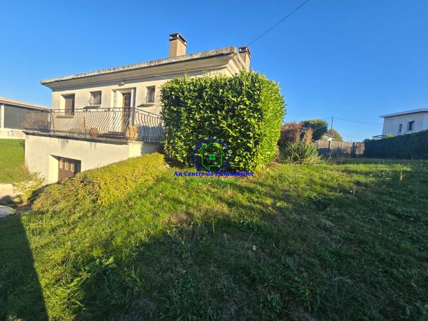 Maison de type 4 avec garage en sous sol