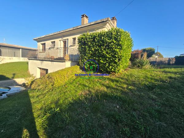 Maison de type 4 avec garage en sous sol